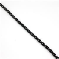 80cts Black Agate Faceted Rice Beads Approx 9x6mm, 38cm Strand